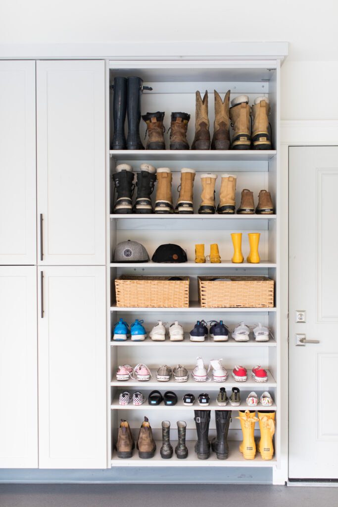 custom shoe closet with family shoes stored